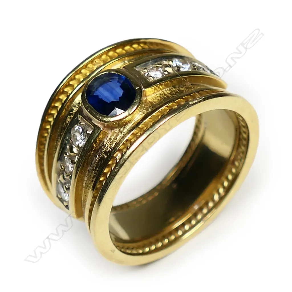 A heavy 18ct yellow gold sapphire and diamond wide band ring, Image 1++