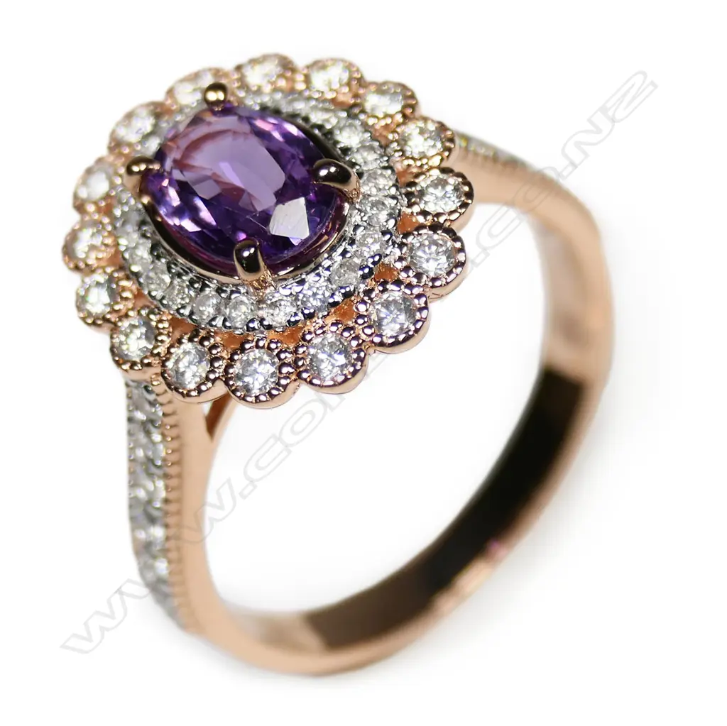 A 14ct rose gold pink sapphire and diamond double halo ring, Image 1++