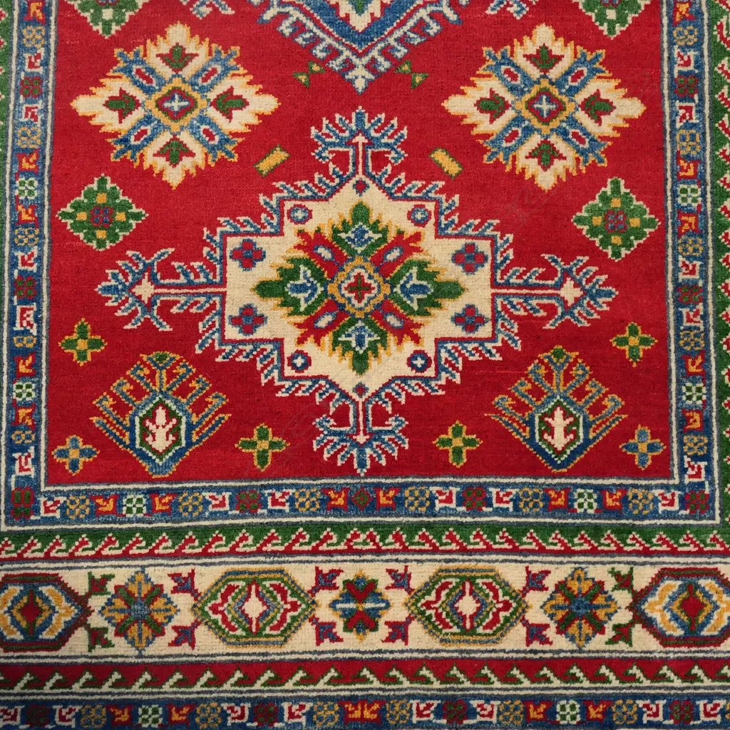 A fine hand-knotted Persian Kazak rug, Image 1++