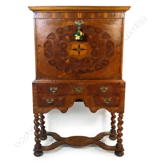 A 19thC Continental walnut secretaire on stand,