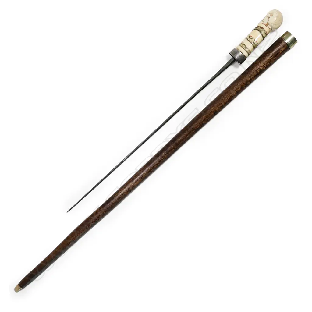 A 20thC marine ivory and scrimshaw handled sword walking stick, Image 1++
