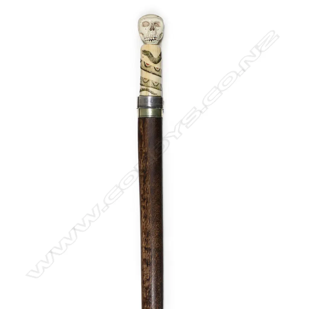 A 20thC marine ivory and scrimshaw handled sword walking stick, Image 1++