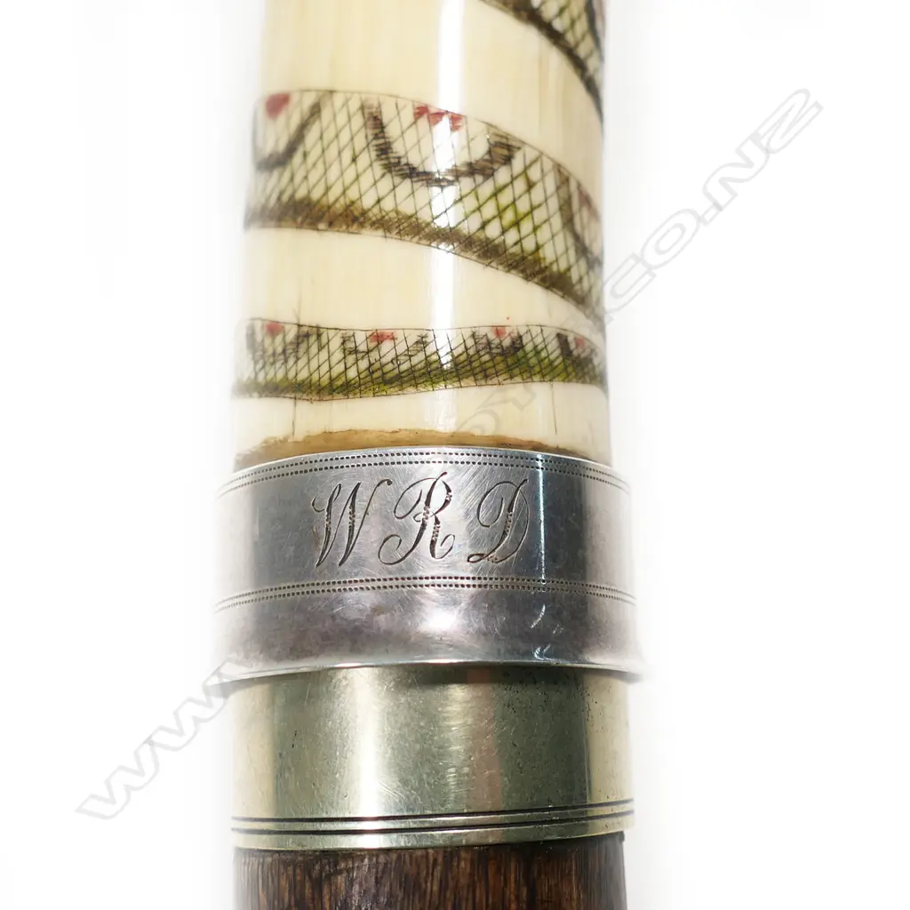 A 20thC marine ivory and scrimshaw handled sword walking stick, Image 1++