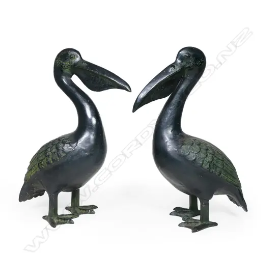 A characterful pair of bronze pelicans,