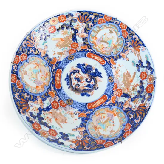 A large hand-painted 19thC Imari charger,