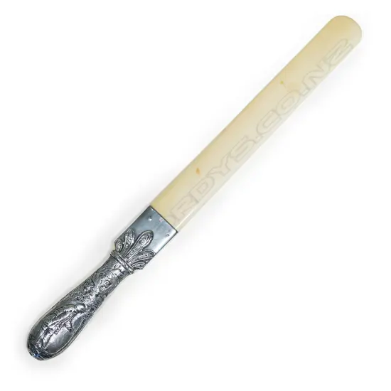 A large and impressive Victorian silver handled and ivory paper knife,