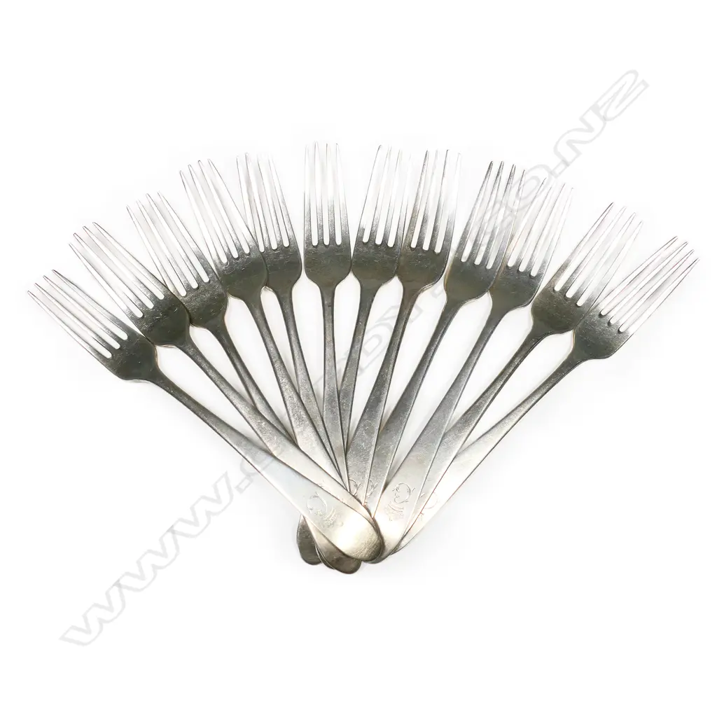 A Harlequin set of 12 Geo. III Irish Celtic-Pointed silver table forks, Image 1++