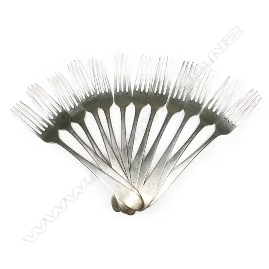 A Harlequin set of 12 Geo. III Irish Celtic-Pointed silver table forks,