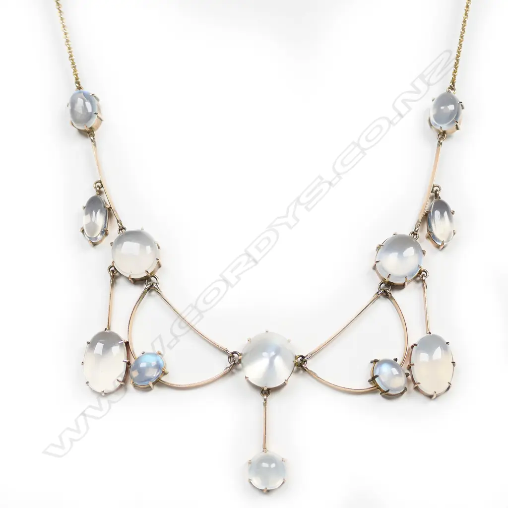 An Edwardian 9ct gold and moonstone necklace and earring set, Image 1++