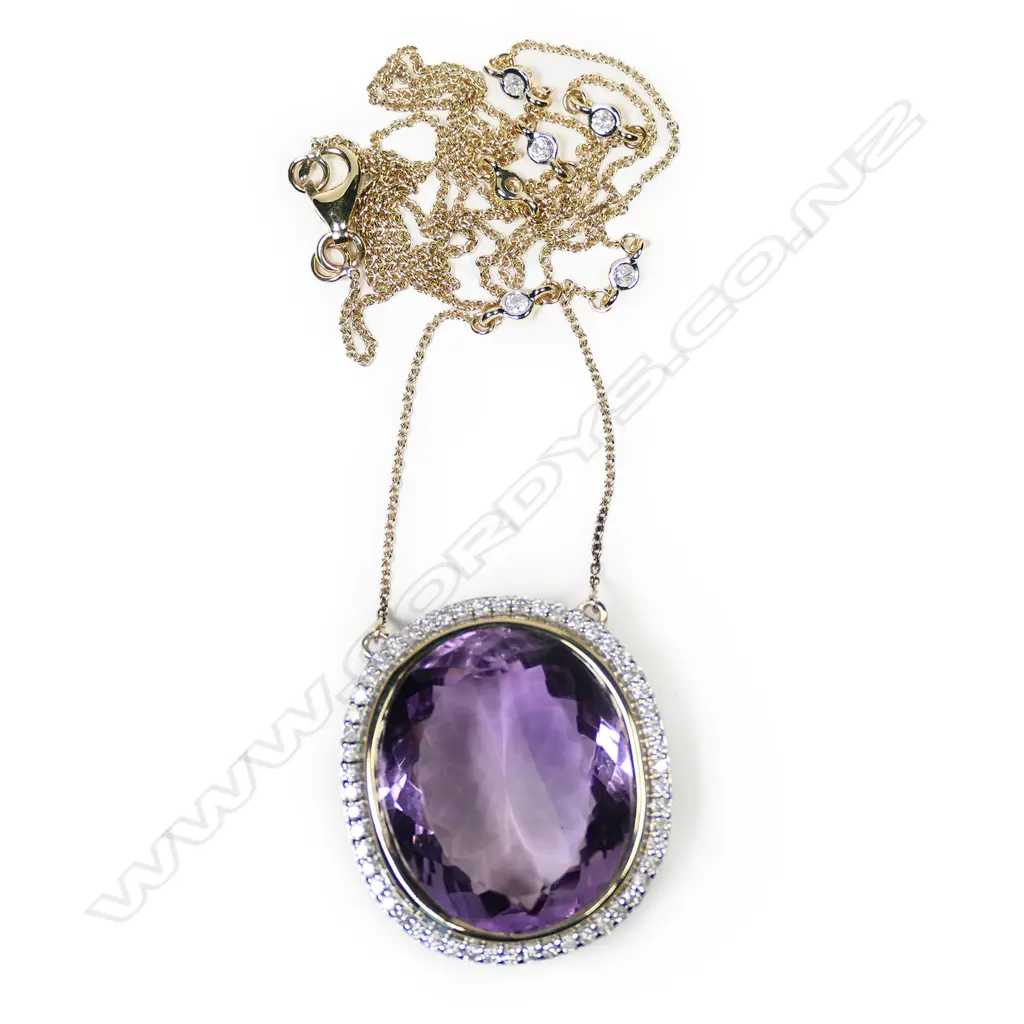 A 10ct gold amethyst and diamond necklace, Image 1++