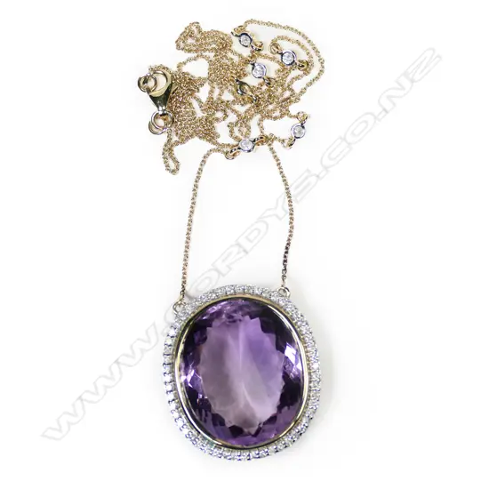 A 10ct gold amethyst and diamond necklace,