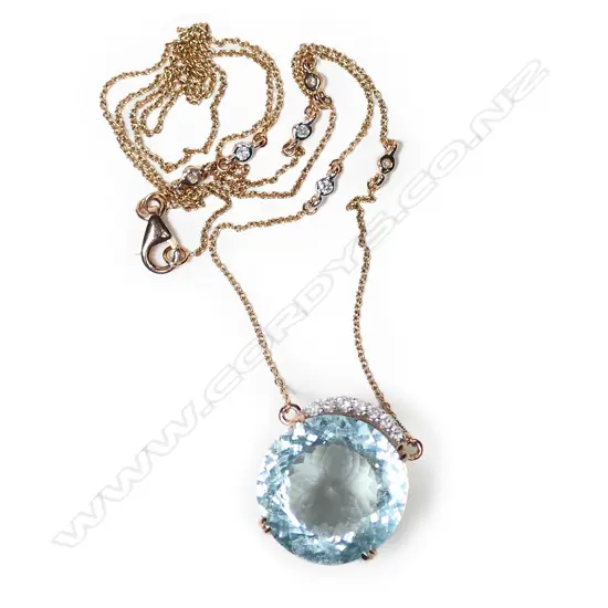 A 14ct rose gold aquamarine and diamond necklace,
