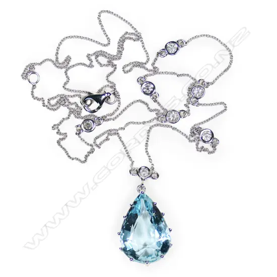 A 14ct white gold aquamarine and diamond necklace,