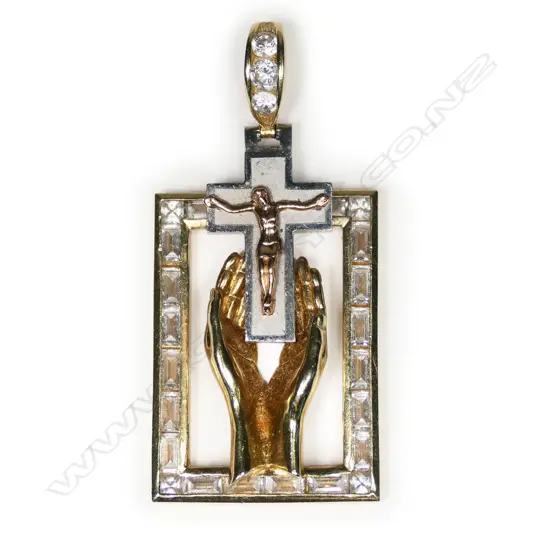 An 14ct gold crucifix pendant,
