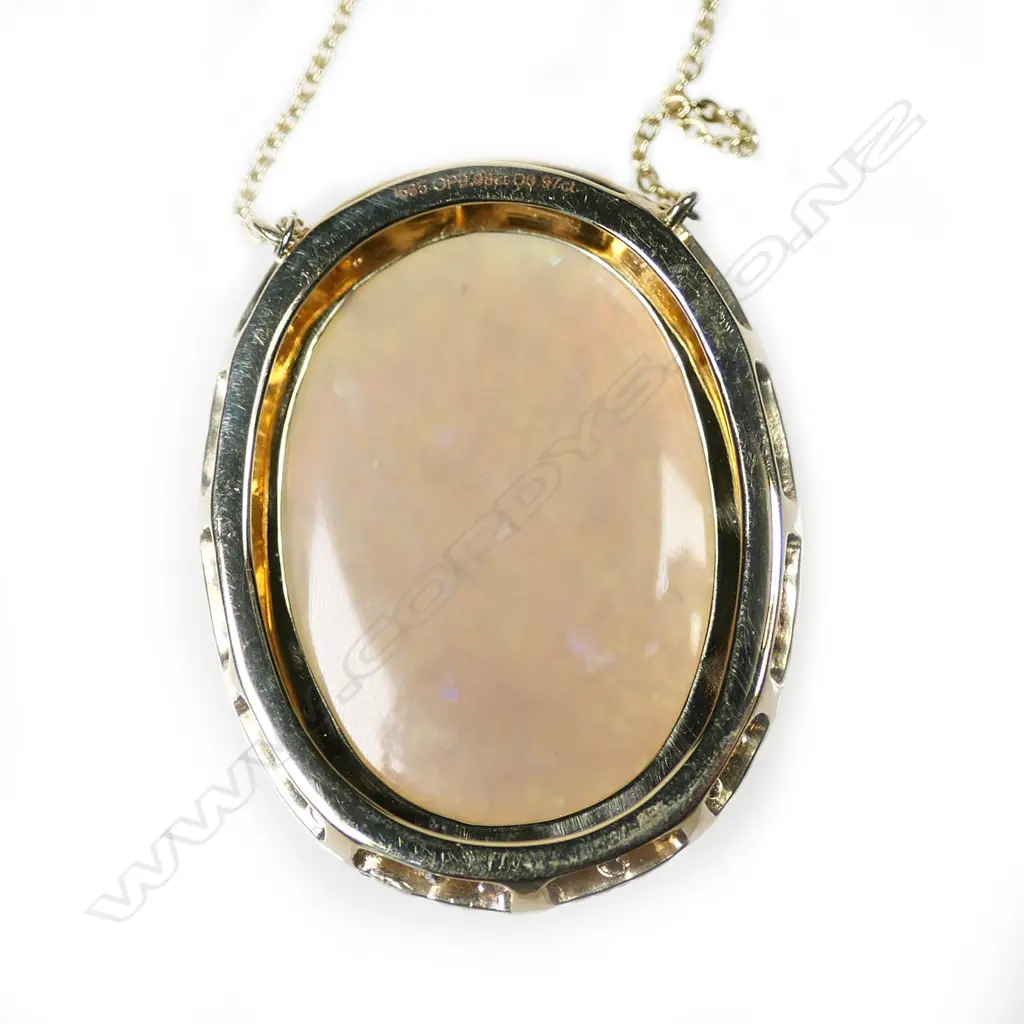 A 14ct gold opal and diamond halo necklace, Image 1++