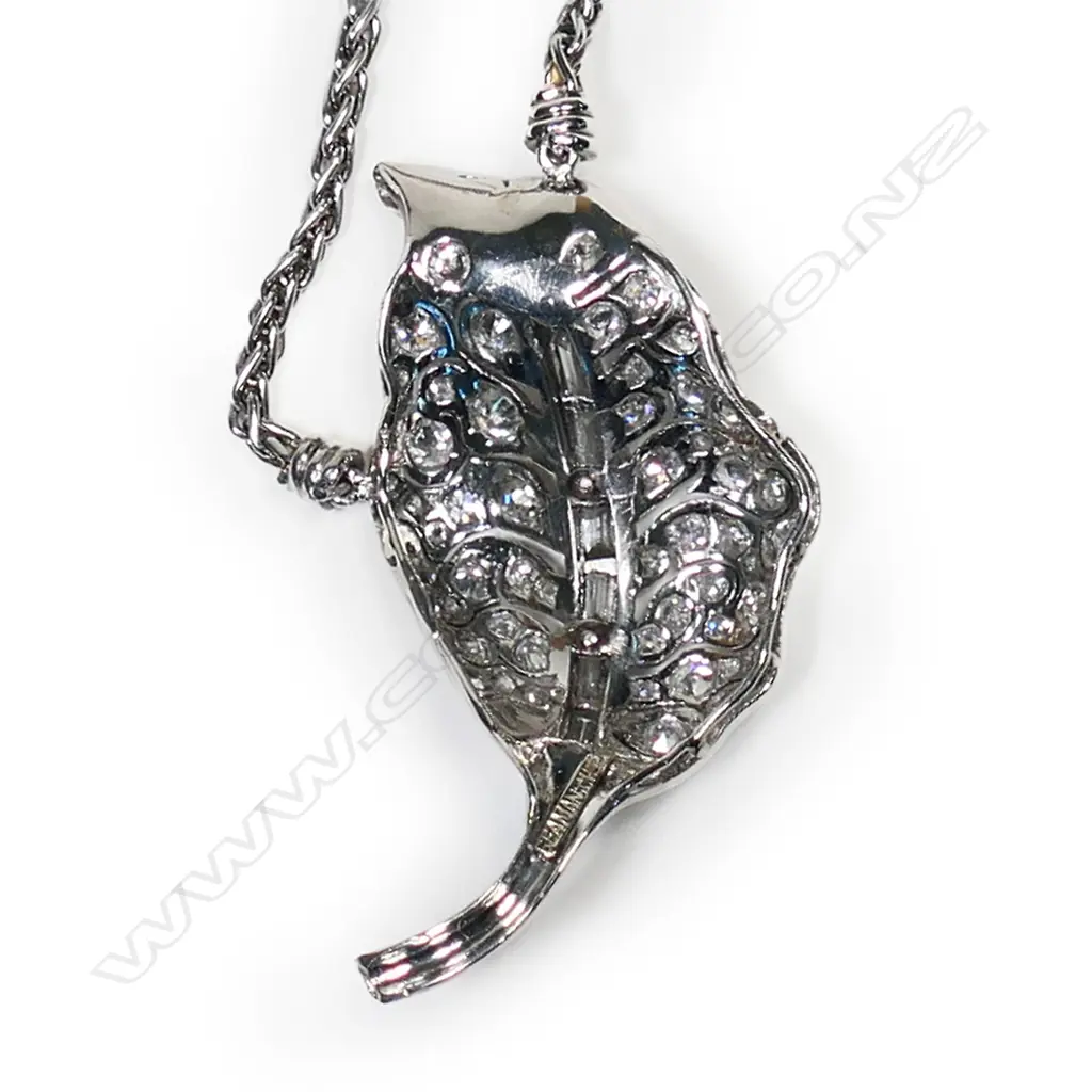 A platinum and diamond pendant on chain, Image 1++