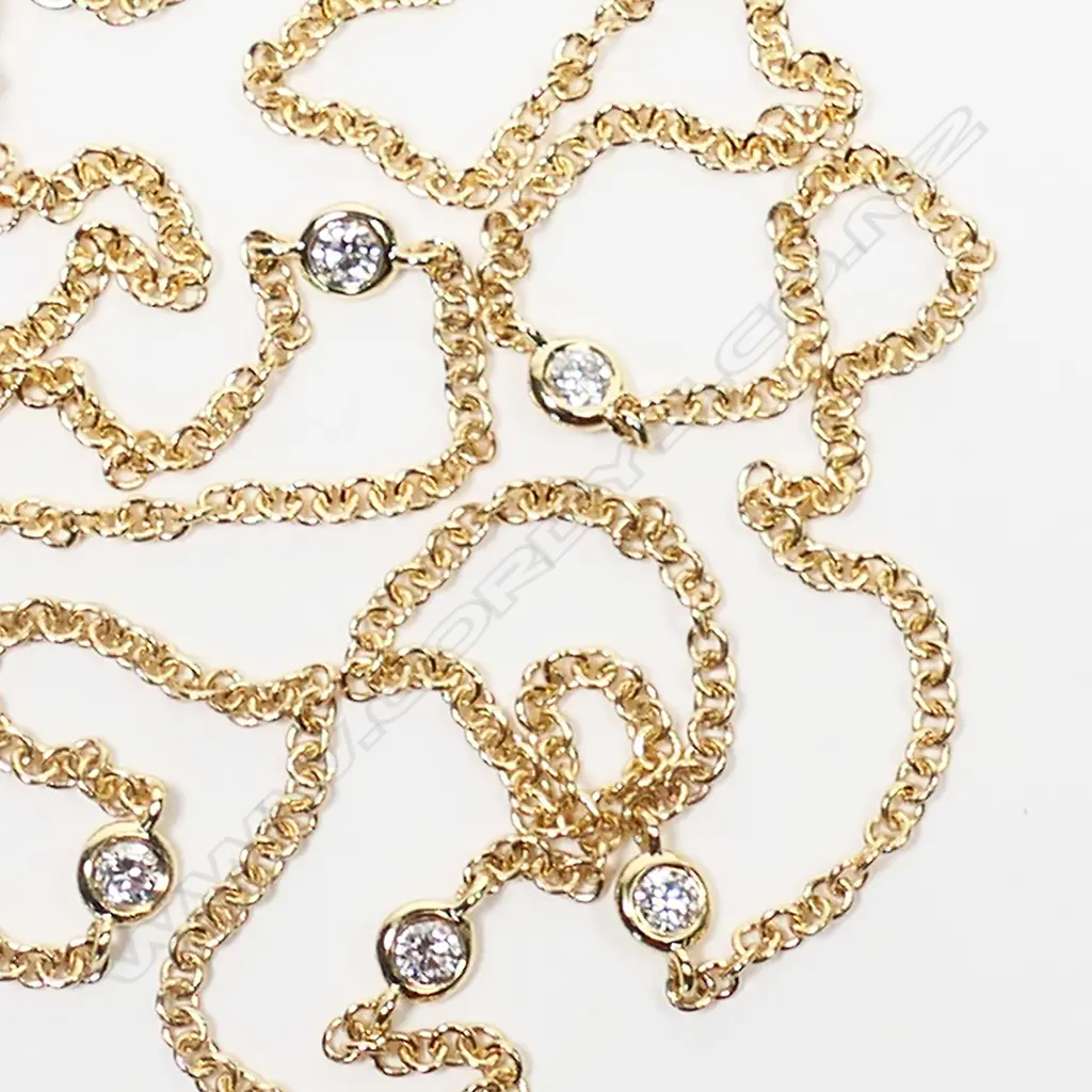 An 18ct yellow gold and diamond necklace, Image 1++