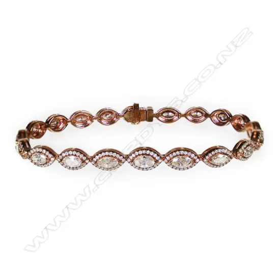 A 14ct rose gold and yellow diamond halo tennis bracelet,