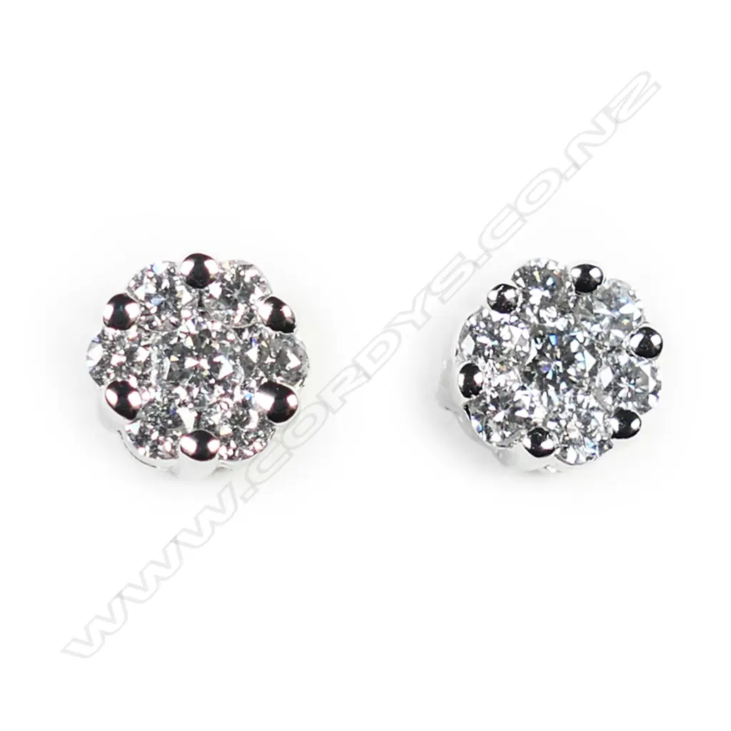A pair of 18ct white gold diamond cluster earrings, Image 1++
