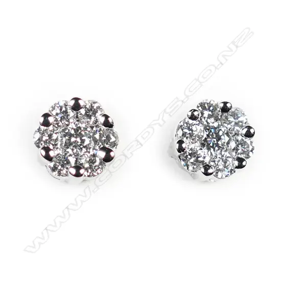 A pair of 18ct white gold diamond cluster earrings,