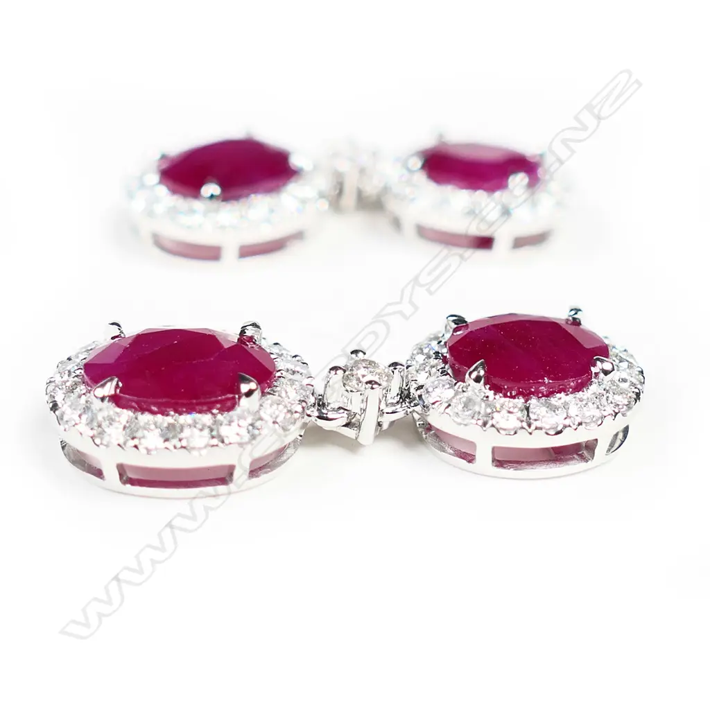 A pair of 14ct white gold ruby and diamond double drop earrings, Image 1++