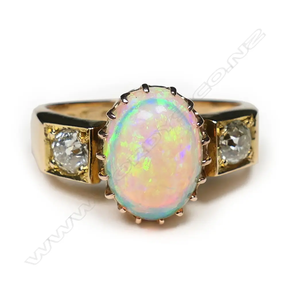 An estate 18ct yellow gold opal and diamond ring, Image 1++
