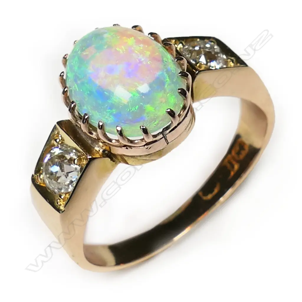 An estate 18ct yellow gold opal and diamond ring, Image 1++