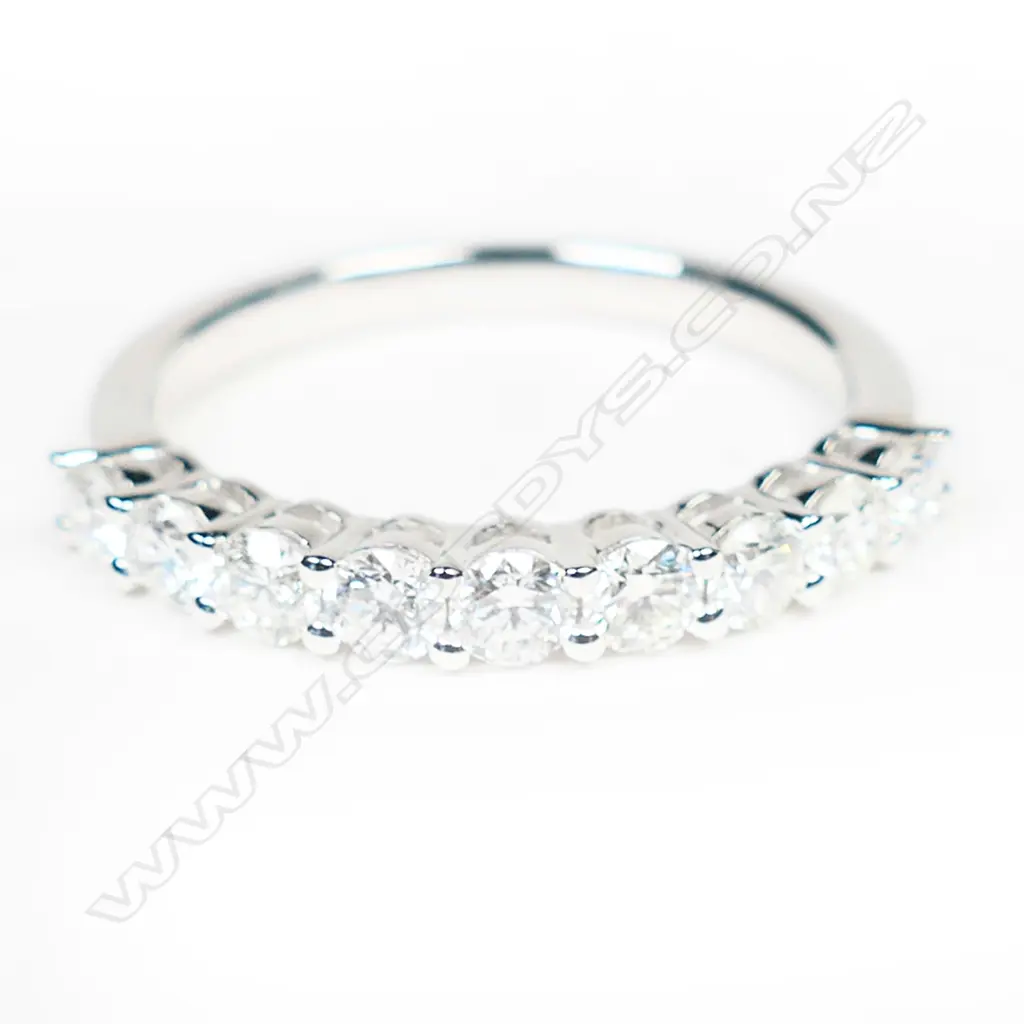 A platinum and diamond ring, Image 1++