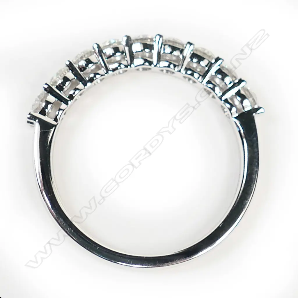 A platinum and diamond ring, Image 1++