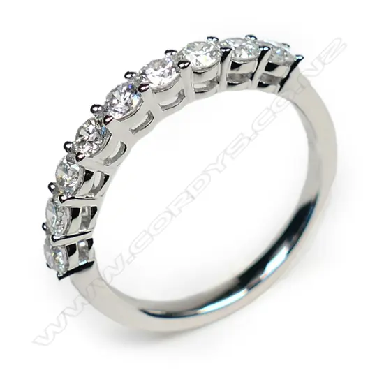 A platinum and diamond ring,
