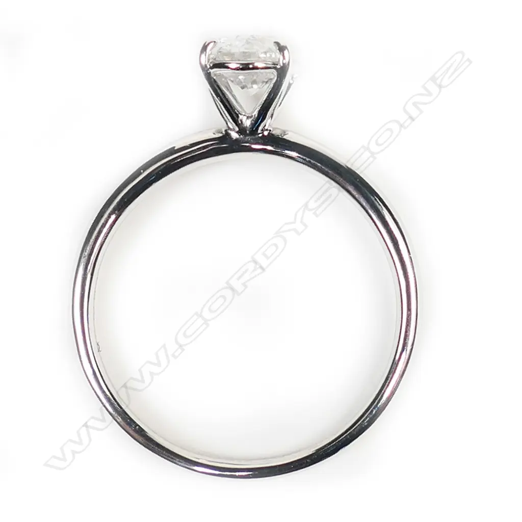 A 14ct white gold and diamond solitaire ring, Image 1++