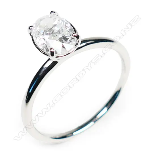 A 14ct white gold and diamond solitaire ring,