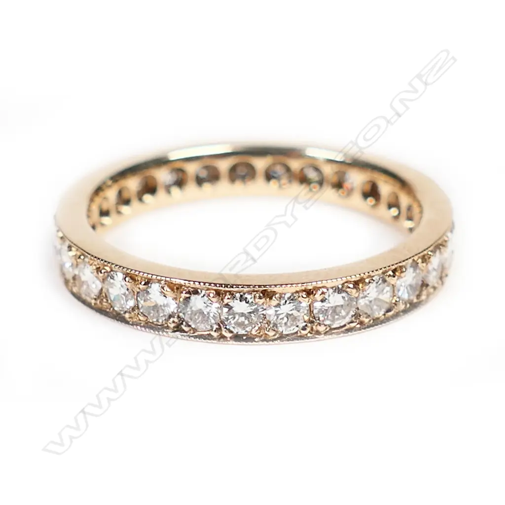 An 18ct rose gold and diamond set band, Image 1++