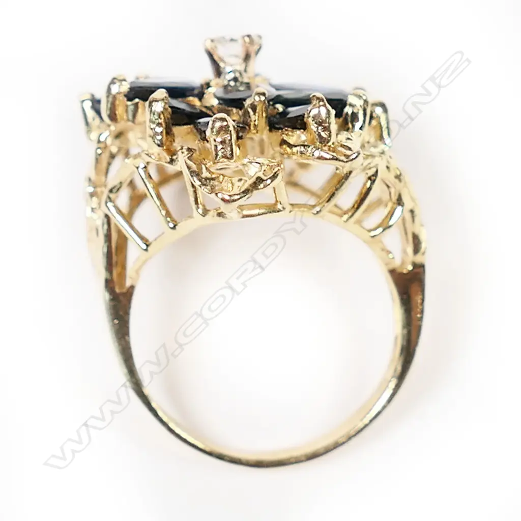 A 14ct gold sapphire and diamond cluster ring, Image 1++