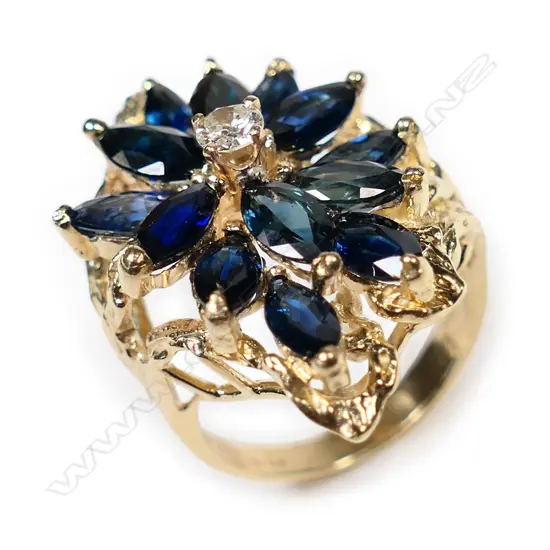A 14ct gold sapphire and diamond cluster ring,