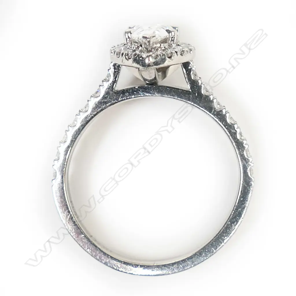 A platinum and diamond ring, Image 1++