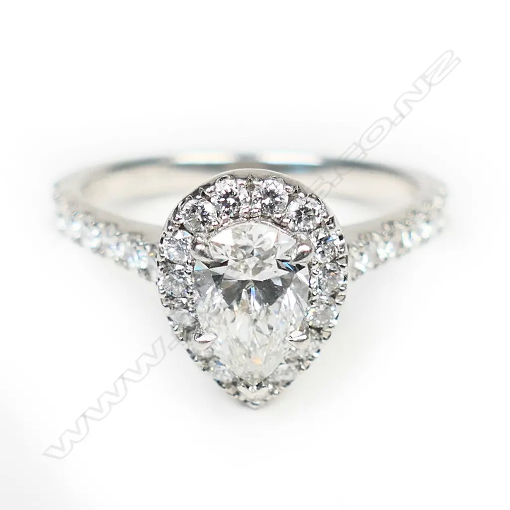 A platinum and diamond ring, Image 1++