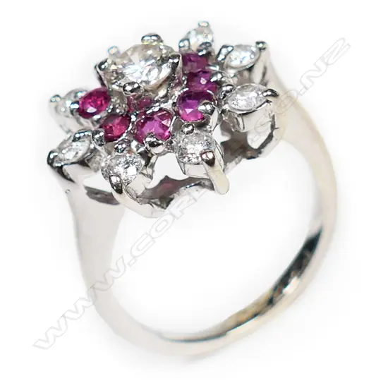 A 14ct white gold ruby and diamond ring,