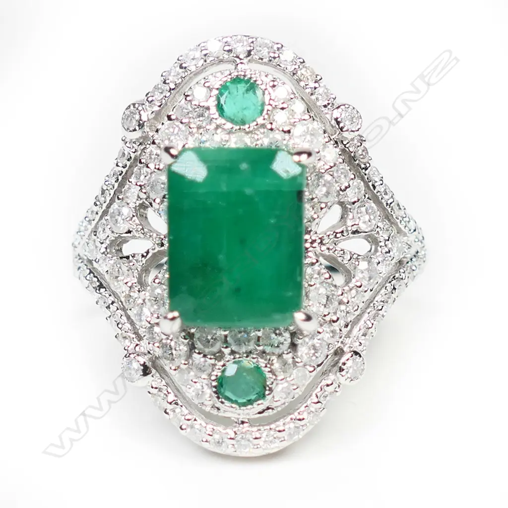 A 14ct white gold emerald and diamond Art Deco style ring, Image 1++