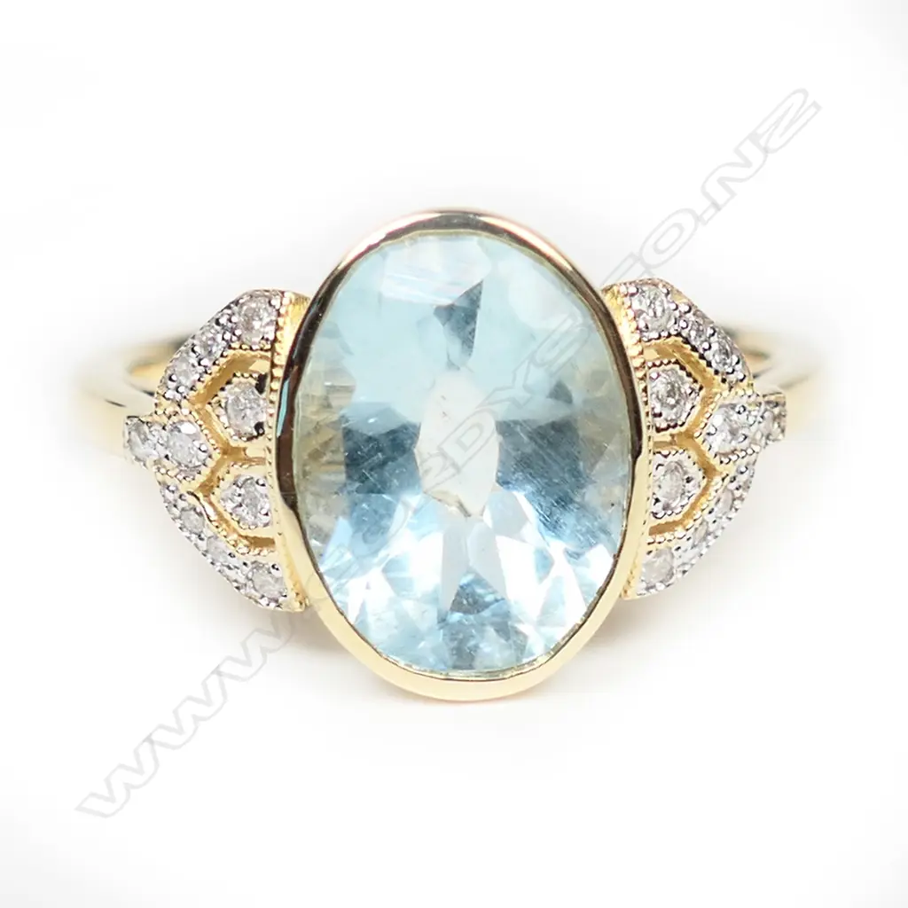 A 14ct gold aquamarine and diamond Art Deco style ring, Image 1++