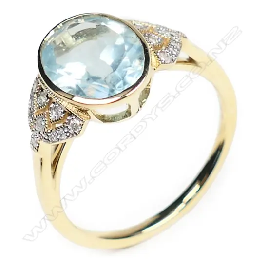 A 14ct gold aquamarine and diamond Art Deco style ring,