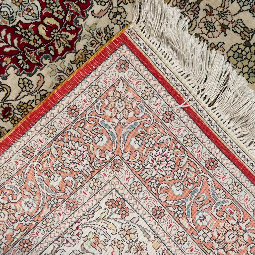 An all silk Hereke carpet Image 1++