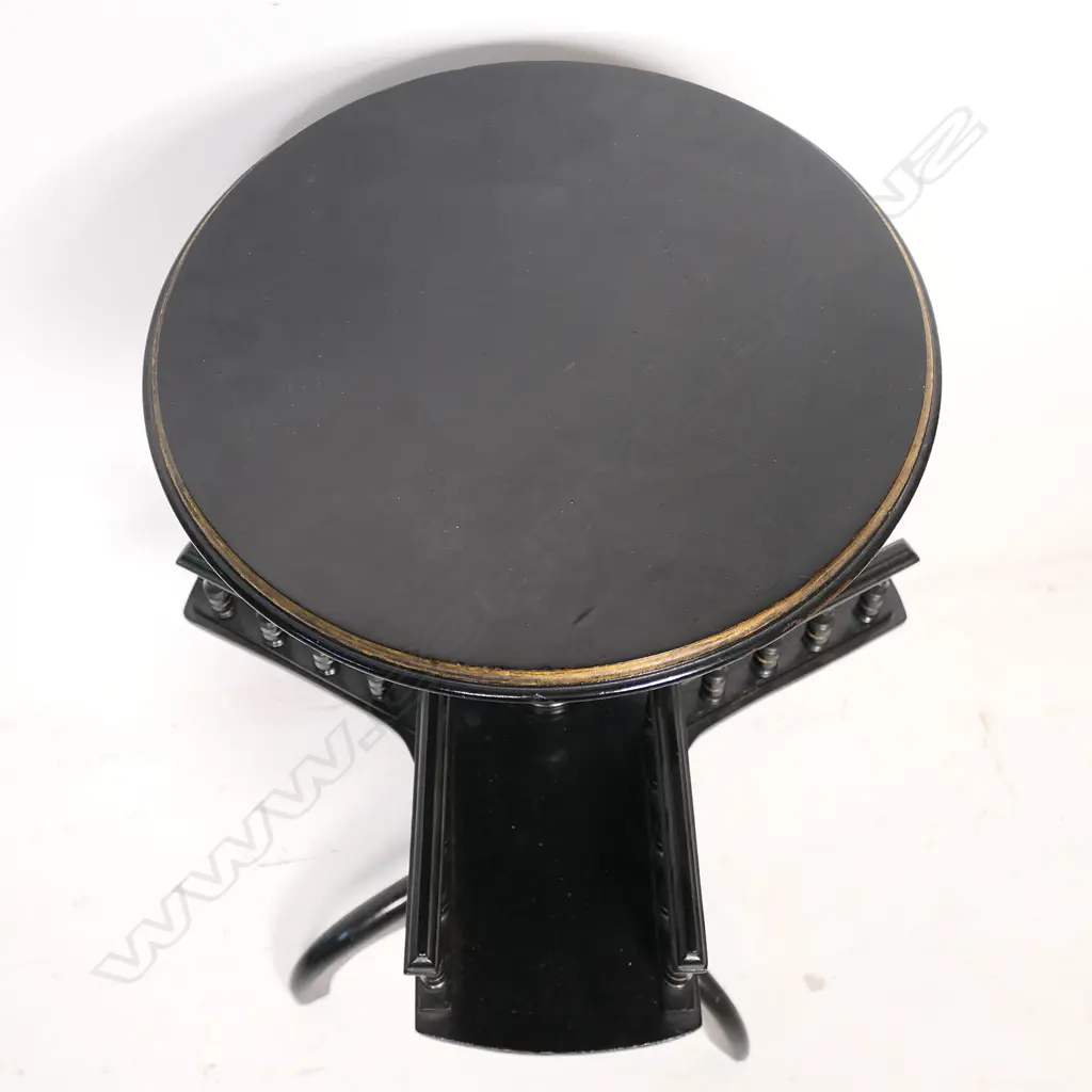 An uncommon Victorian ebonised tripod wine table, Image 1++