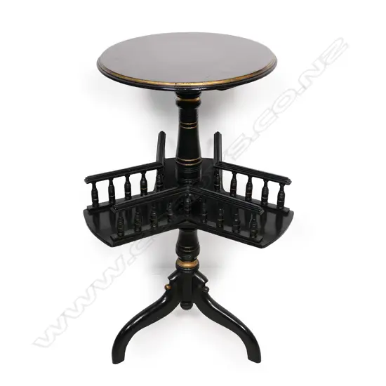 An uncommon Victorian ebonised tripod wine table,