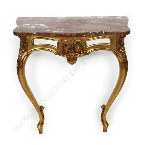 A mid 20thC French style carved giltwood and marble console table,