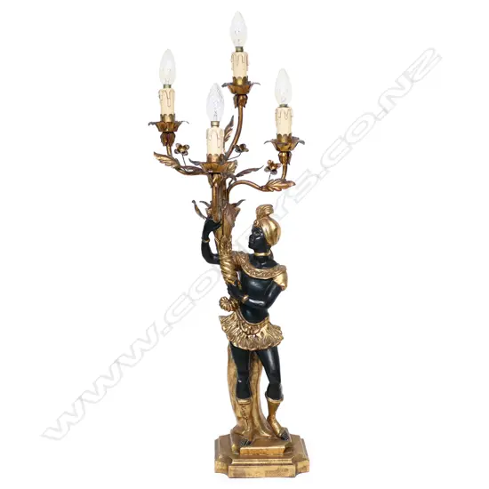 A decorative candelabra table lamp,