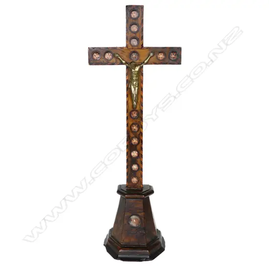 A 19thC European olive wood standing crucifix,