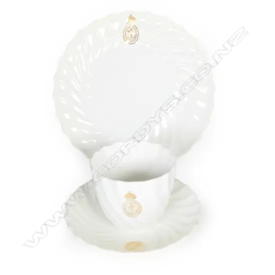 A cup/saucer/place set from H.M.S. Hood,