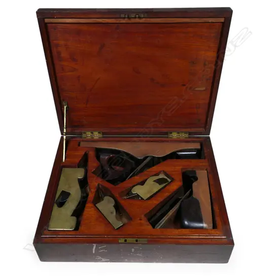 A builder’s rosewood plane case,