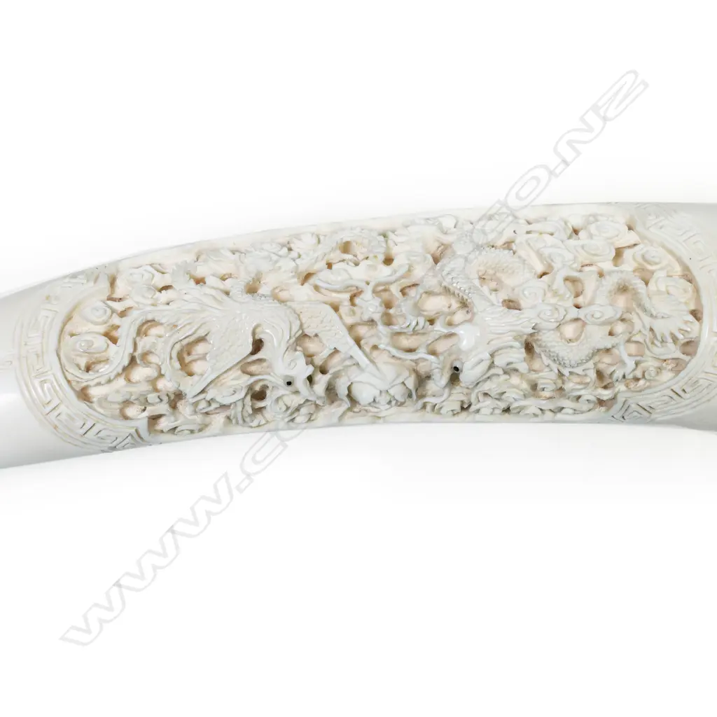 A carved ivory tusk, Image 1++